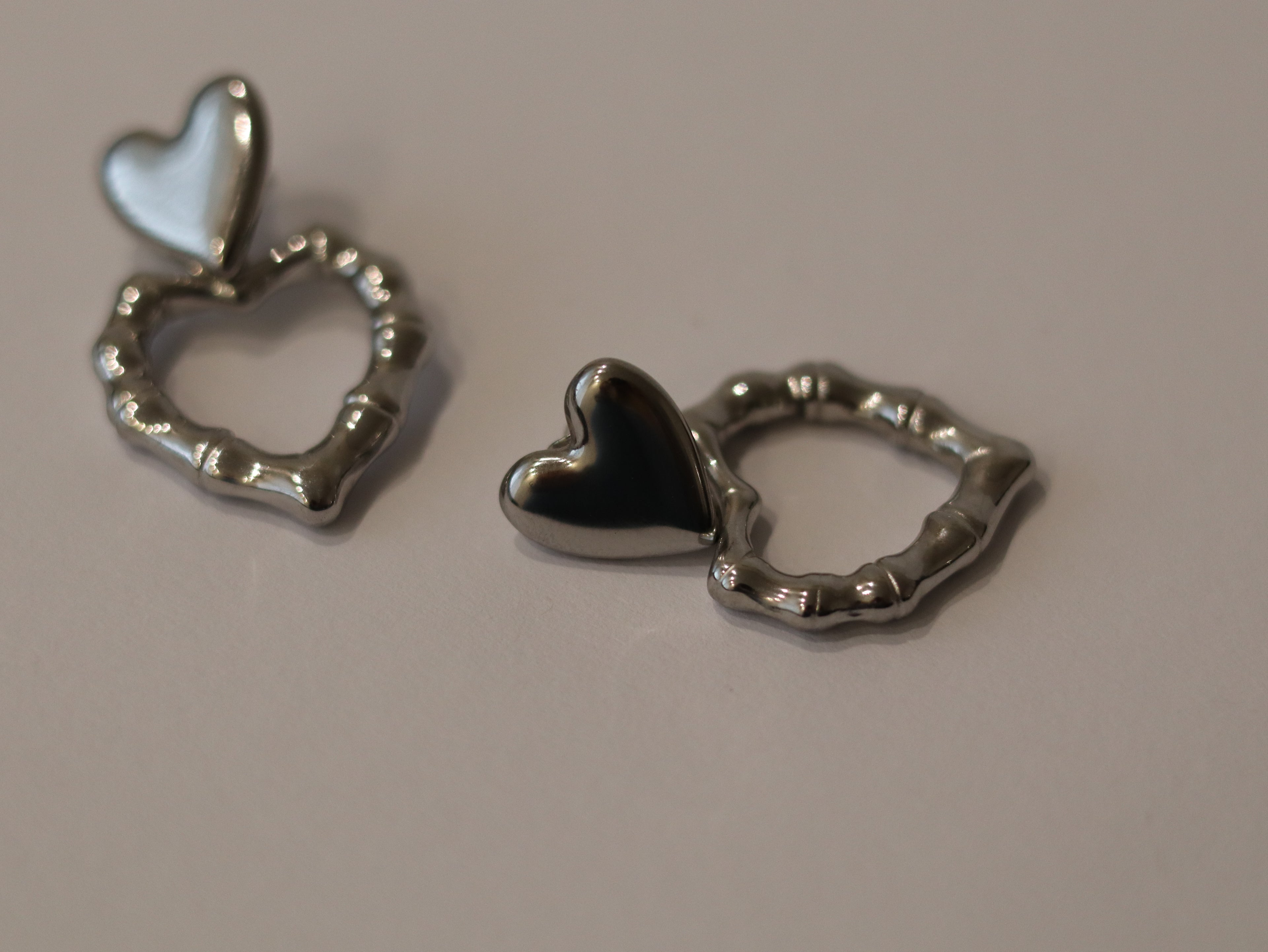 Brincos Coração Duplo Prateado