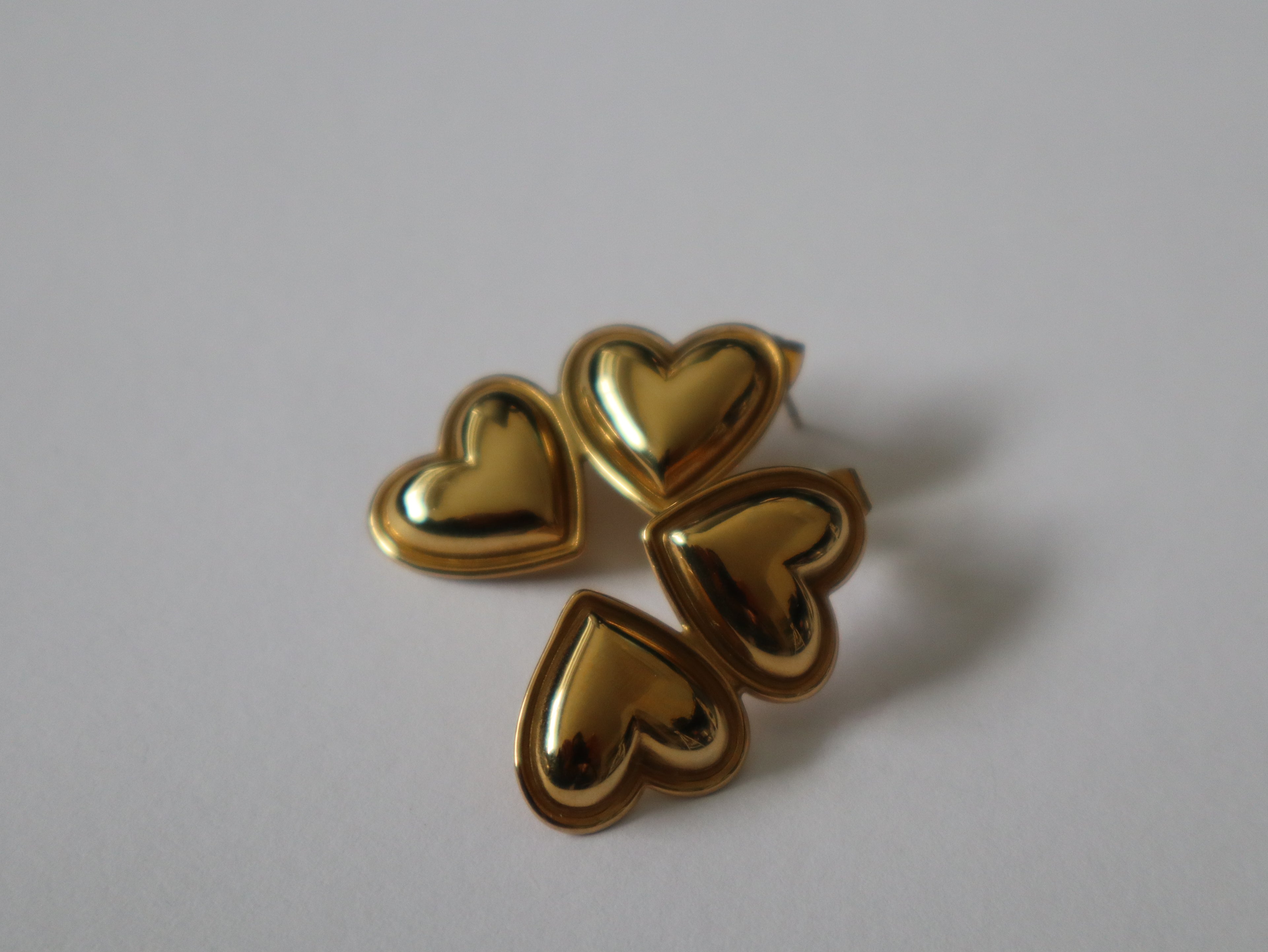 Brincos Duplo Coração Dourado